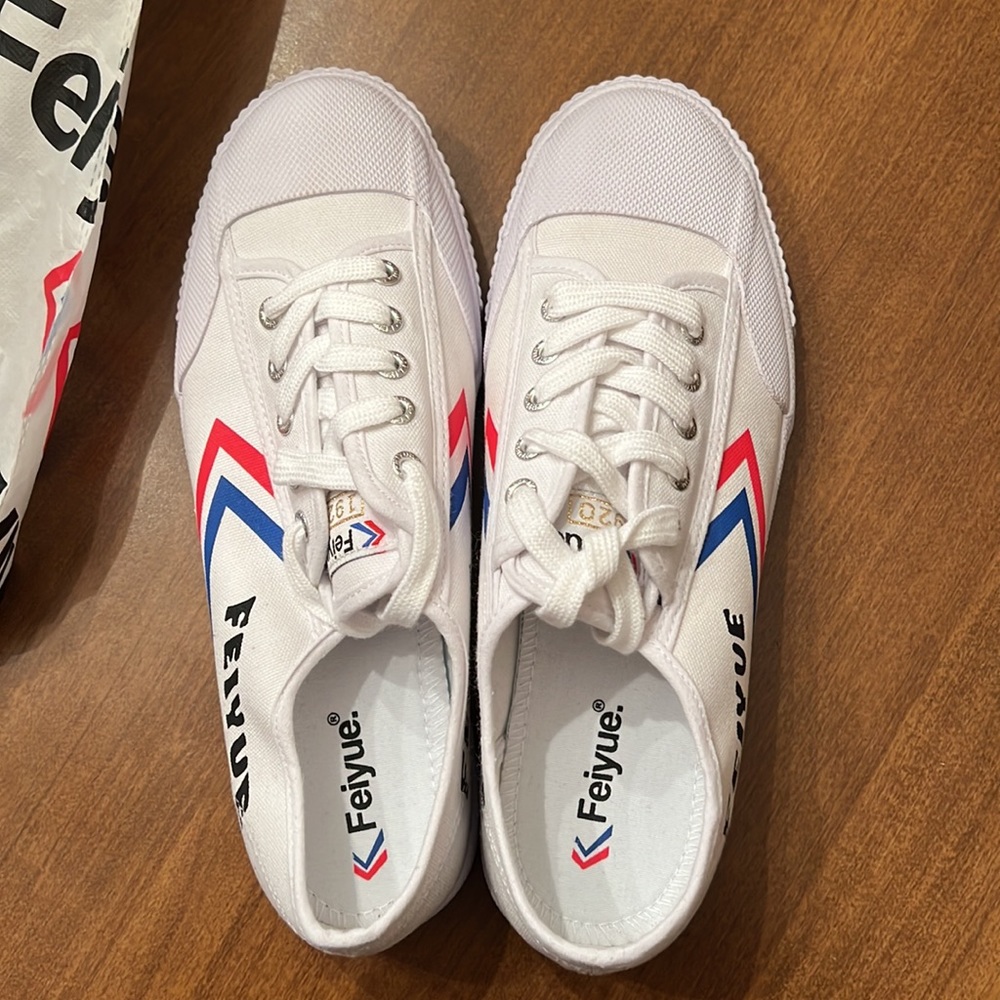 Men’s Feiyue loafer shoes in Red White and Blue.